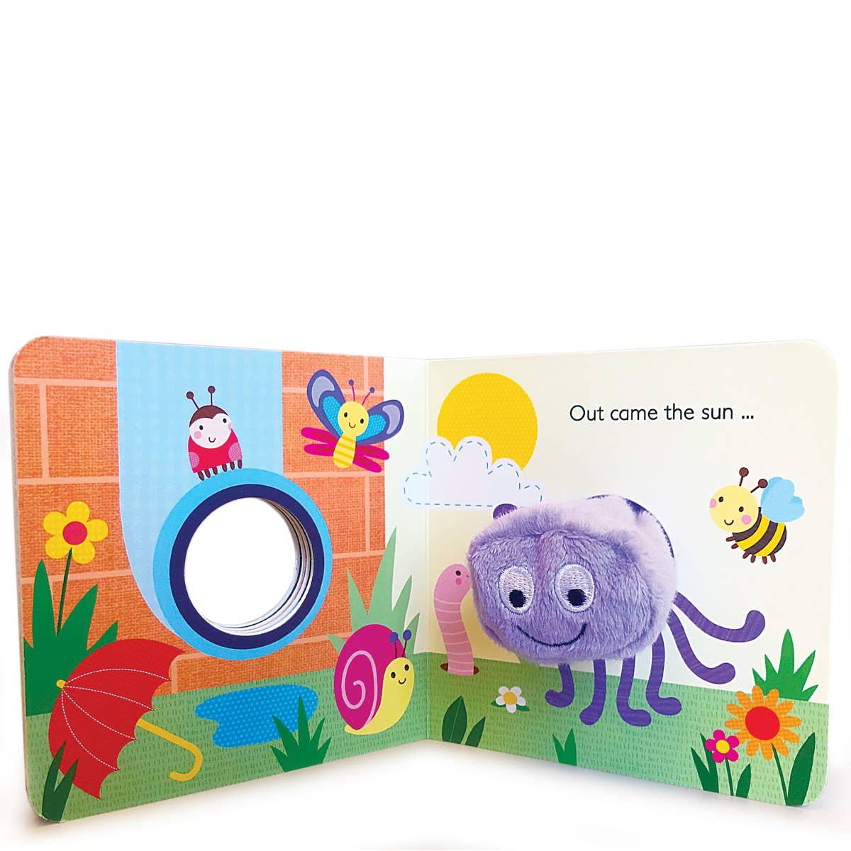 Children's soft book with colorful illustrations and a plush toy inside