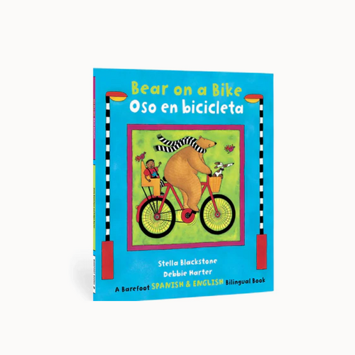 Children's book cover with a bear on a bike illustration and bilingual text