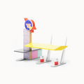 Toy fuel station with a yellow platform and 'Rocket Fuel' sign on a white background