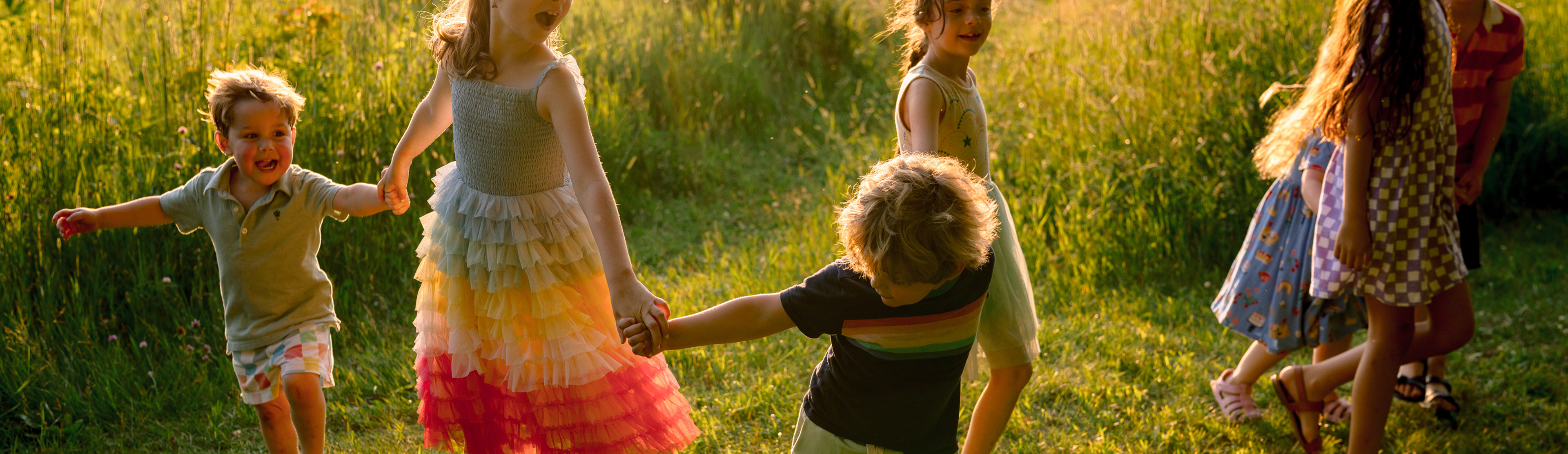 Young kids playing in a field