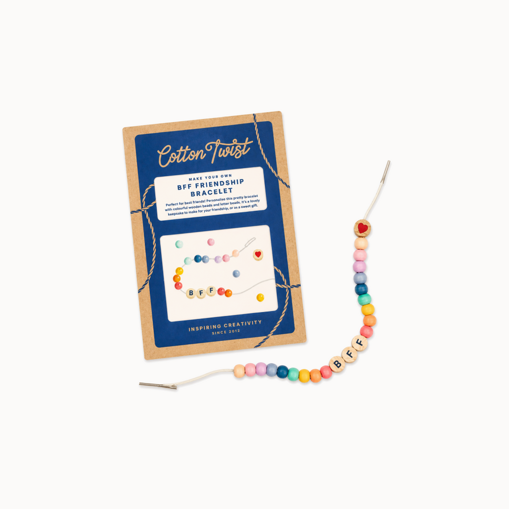 Cotton Twist friendship bracelet kit with colorful beads and 'BFF' letters on a white background