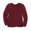 A maroon, crew neck, long-sleeved pullover sweater with a traditional zigzag pattern.