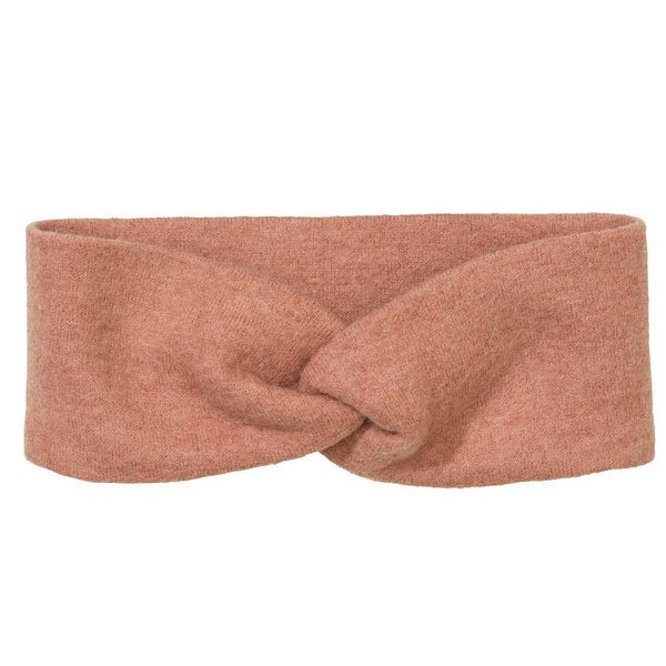 A soft pink boiled wool headband with a twist in the middle, presented on a neutral background.