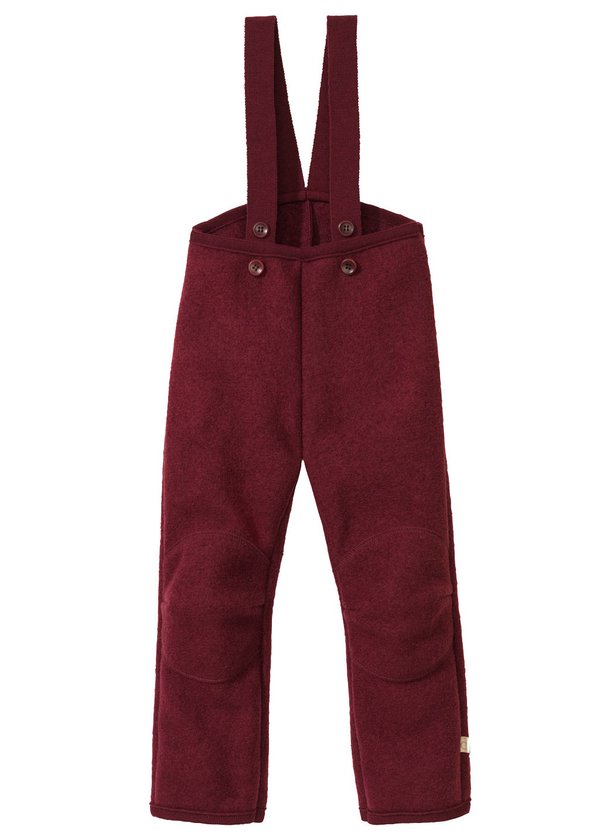 Red boiled wool trousers on a white background