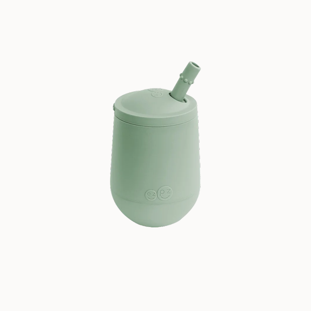 EZPZ Mini Cup and Straw Training System packaging, showing a green silicone mini cup with a straw.