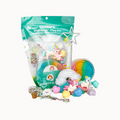 Unicorn-themed kid dough play kit with colorful packaging and toys on a white background