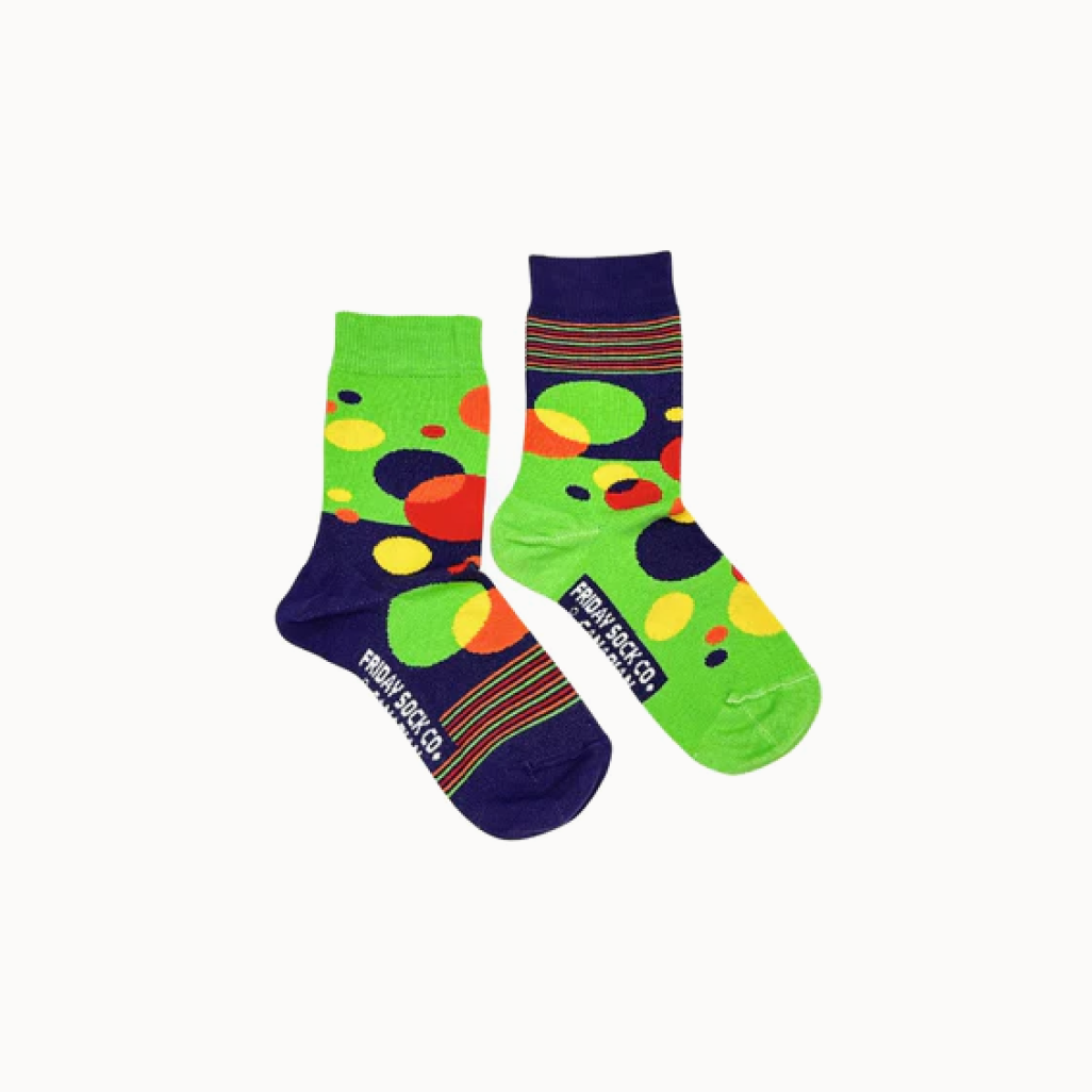 Colorful socks with polka dot pattern on a white background.