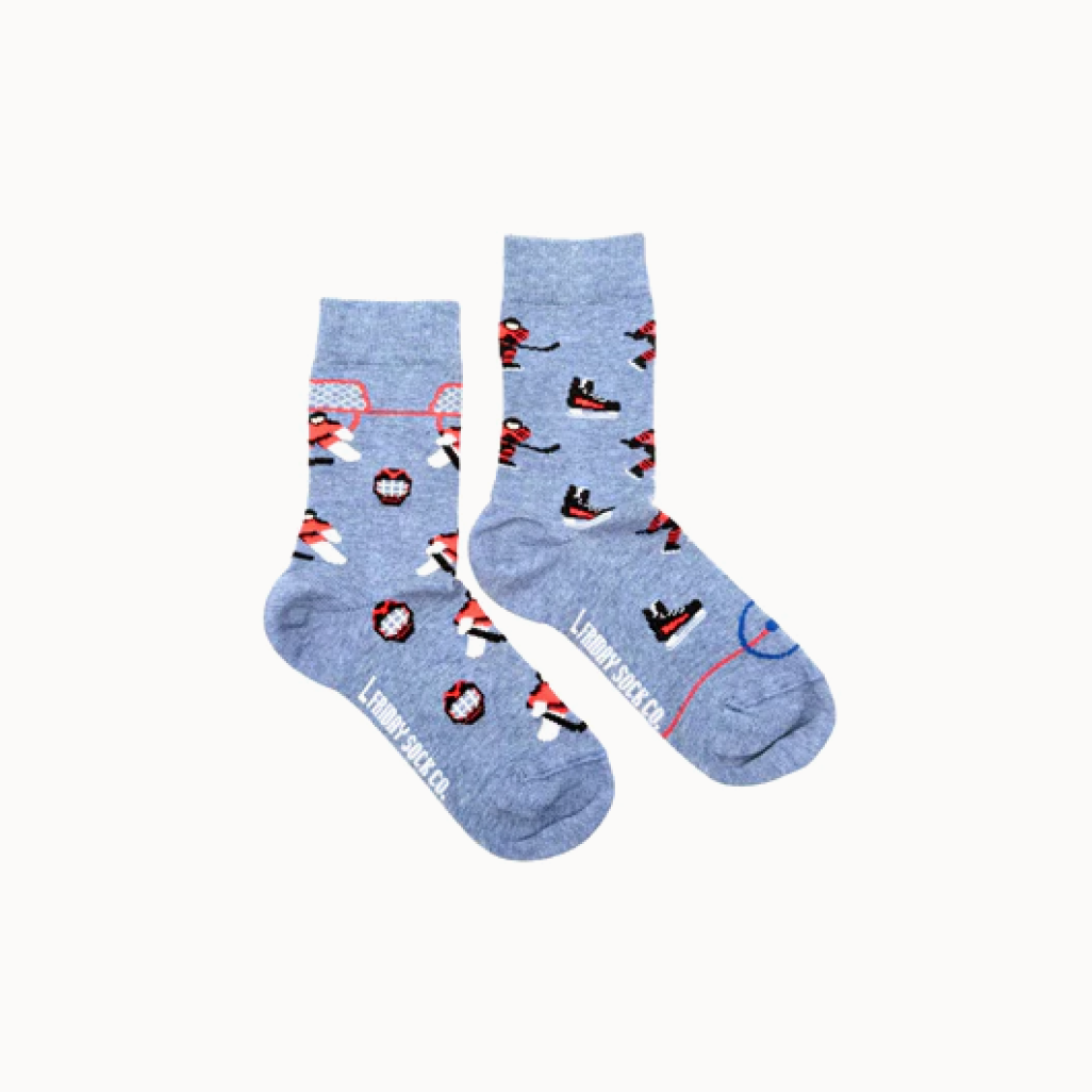 Blue socks with hockey-themed design on a white background