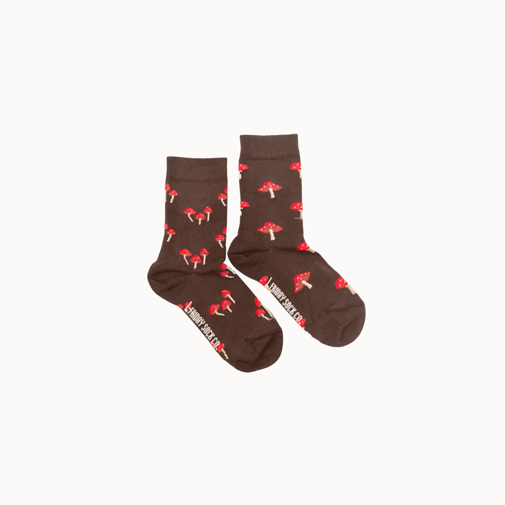 Brown socks with red mushroom pattern on a white background