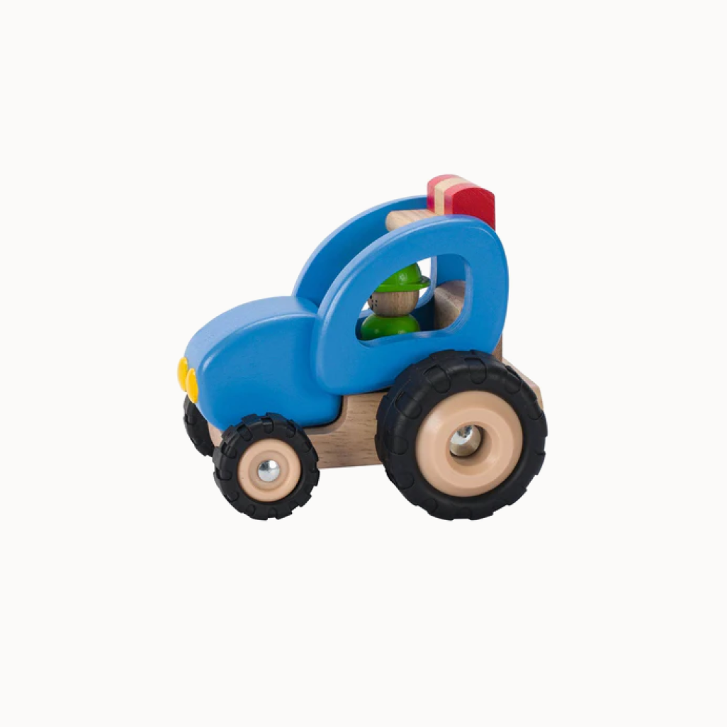 Wooden toy truck with colorful blocks on a white background