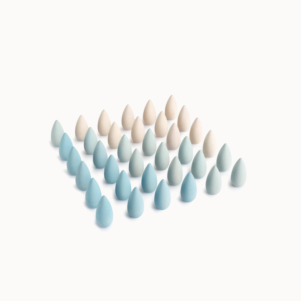 Set of white and blue wooden pieces