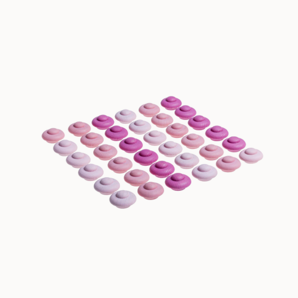 Set of wooden mandala flowers in pink colors
