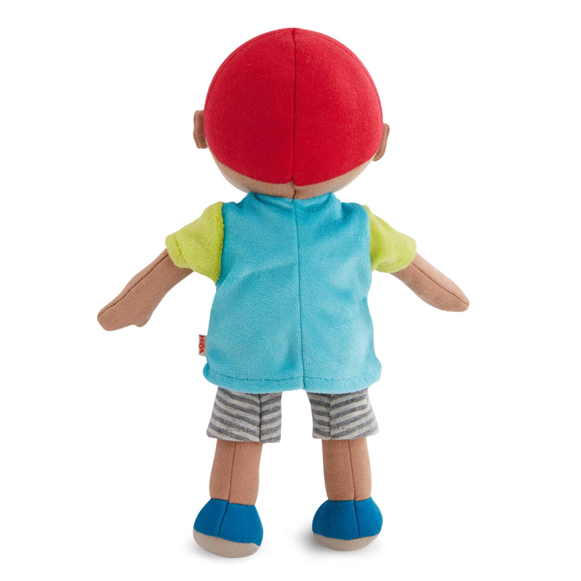 Plush toy with a red hat, blue shirt, green sleeves, gray shorts, and blue shoes on a white background