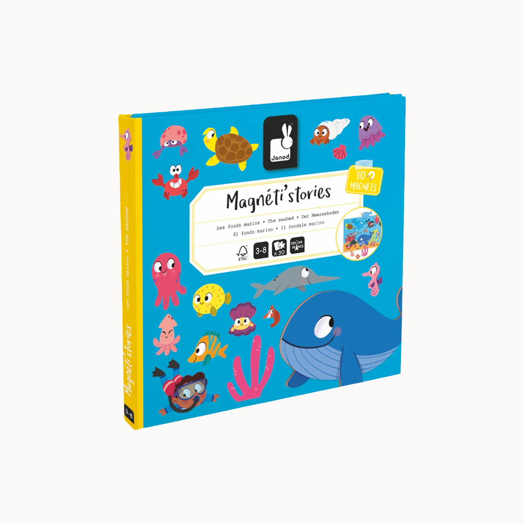 Box of 'Magneté Stories' with colorful sea-themed magnets on a white background