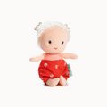 Stuffed doll with red outfit and white headband on a white background