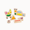 Wooden toy set with colorful shapes on a white background