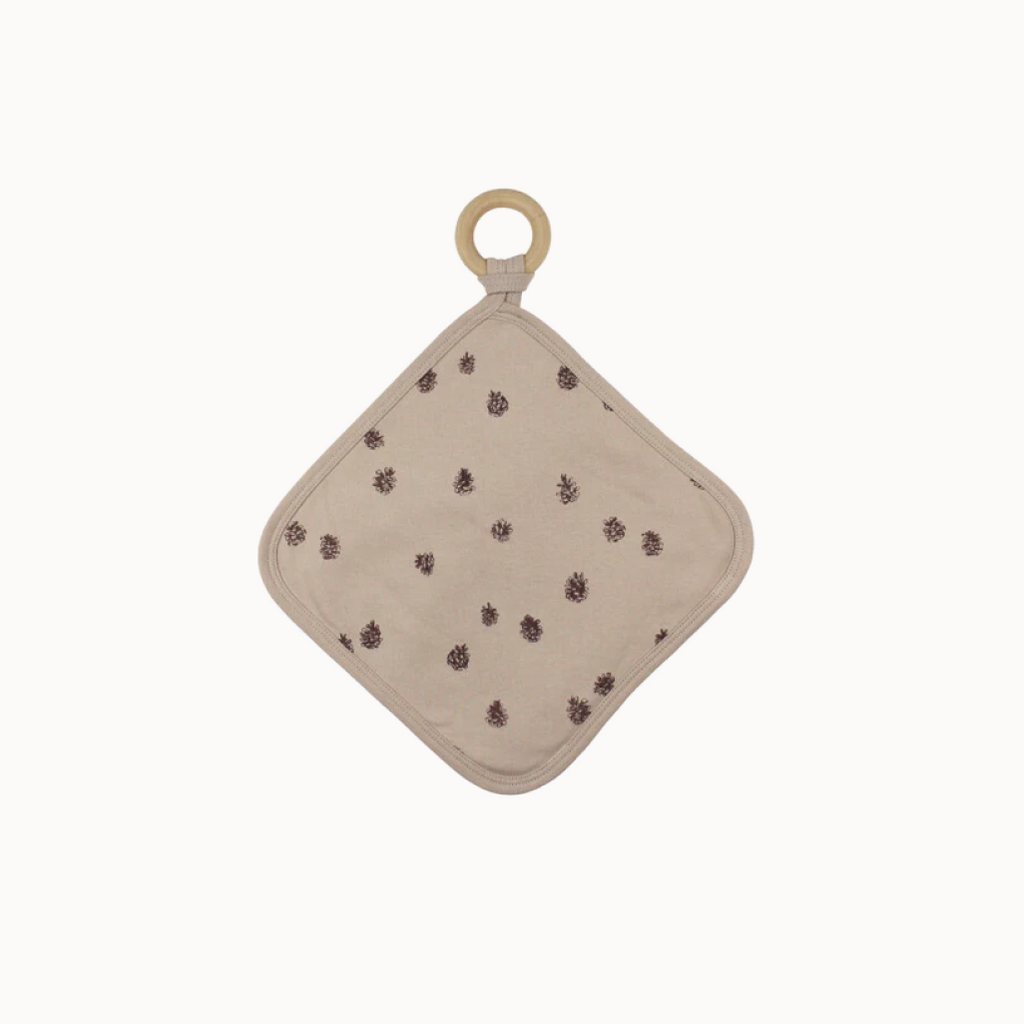 Oatmeal colored lovey with pinecone pattern and attached teething ring