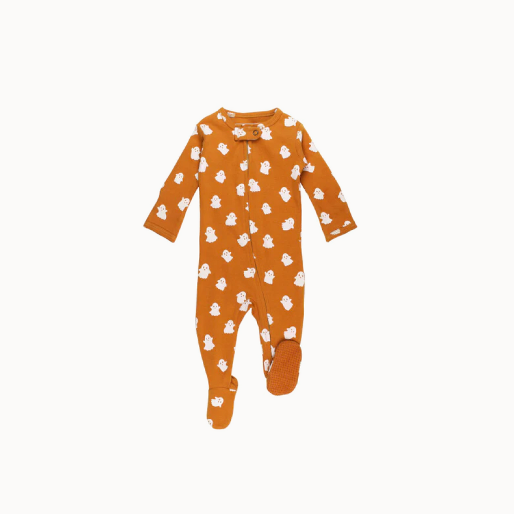 Orange baby onesie with white ghost pattern on a white background