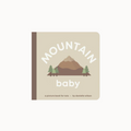 Book titled 'Mountain Baby' with a mountain and trees illustration on a beige background