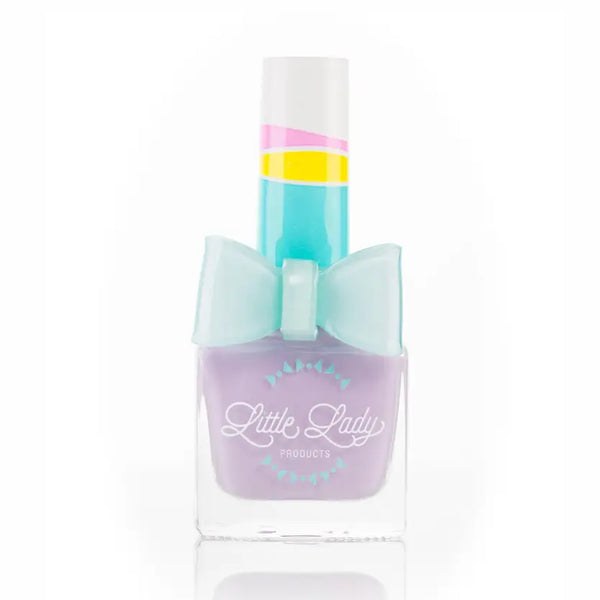 Nail polish bottle with a bow on a white background