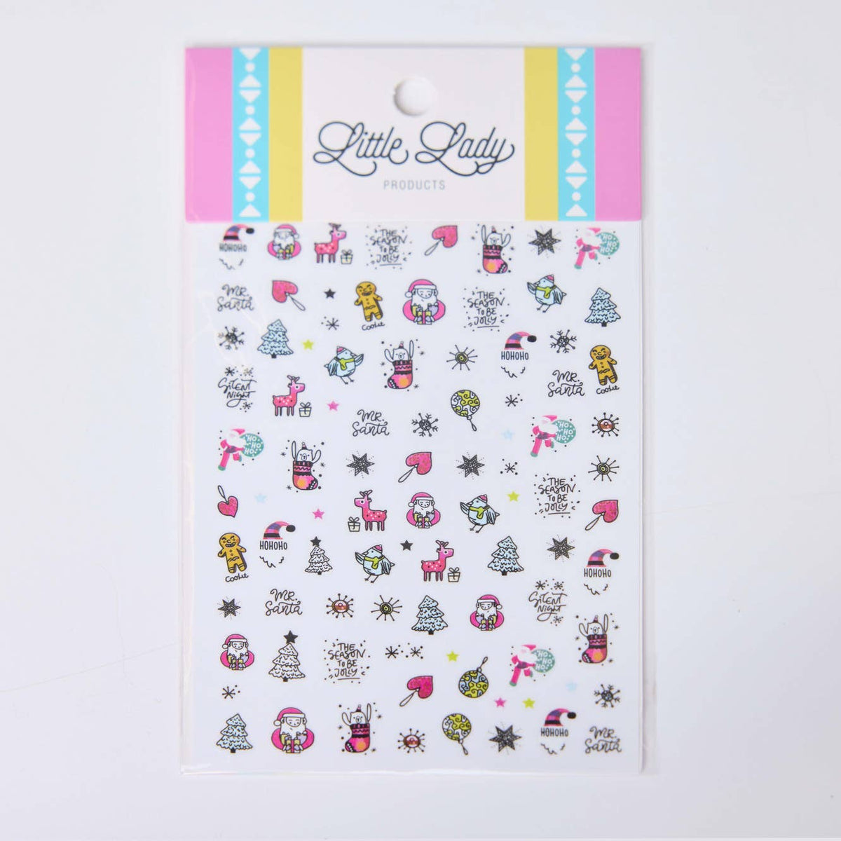 A sheet of decorative nail stickers by Little Lady Products, featuring a colorful holiday theme with Santa Claus, reindeer, snowflakes, and gingerbread men on a white background.