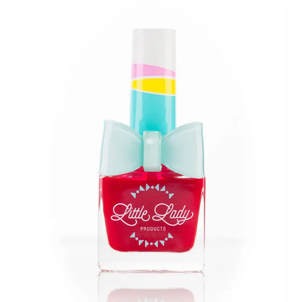 Red nail polish bottle with 'Little Lady Products' branding on a white background