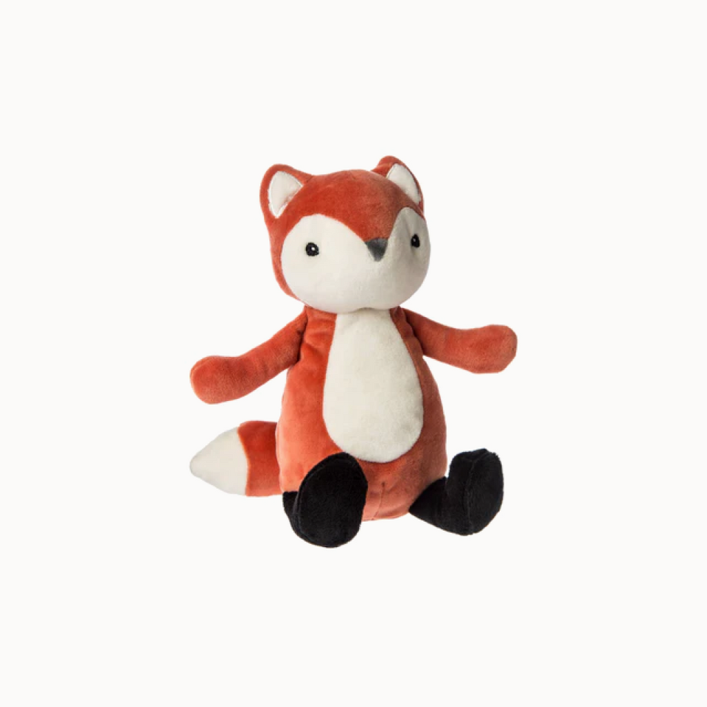 Plush fox toy on a white background