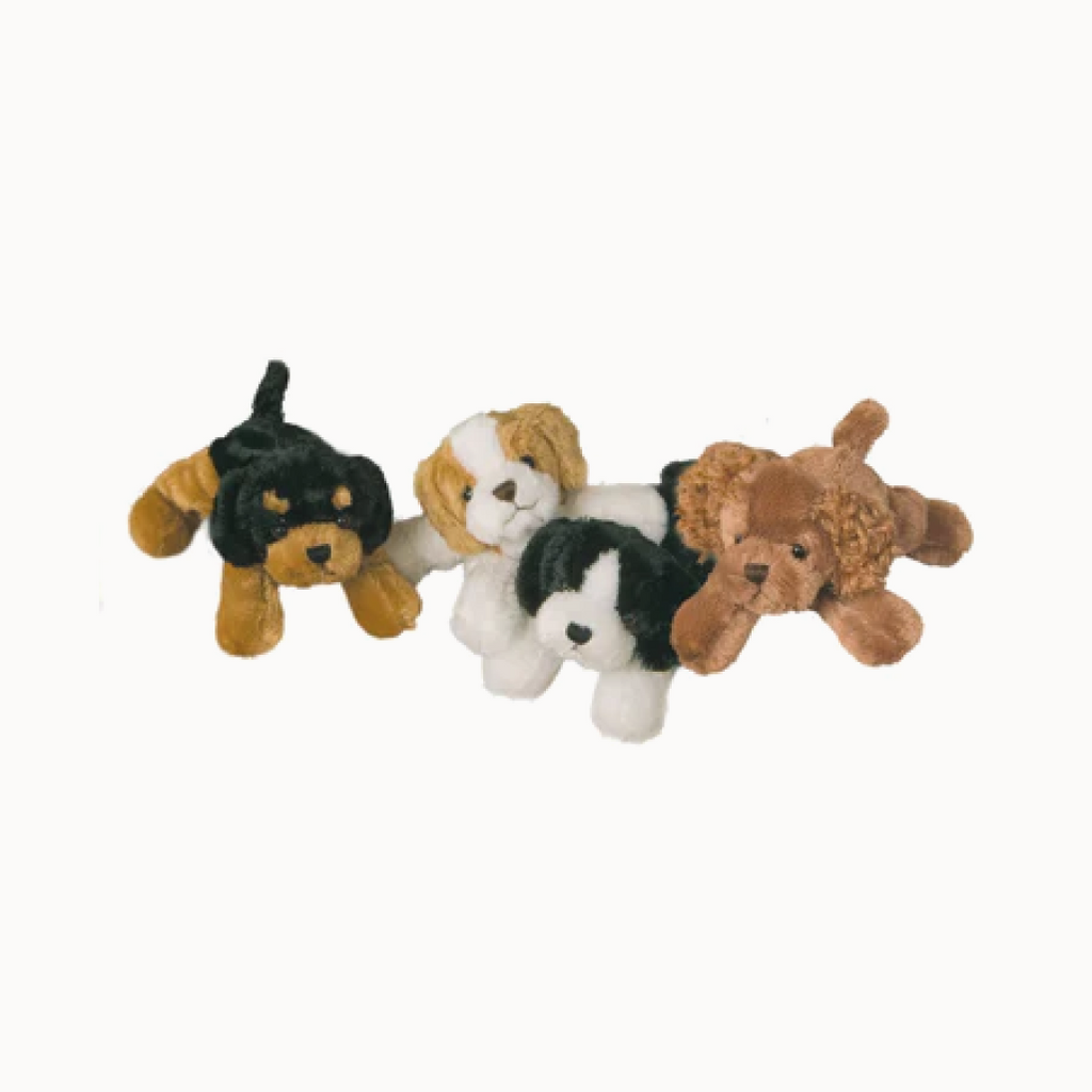 Four plush dog toys in different colors on a white background
