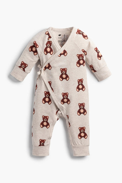 Baby romper with teddy bear pattern on a white background