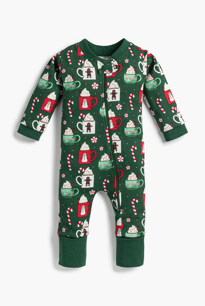 Green baby onesie with festive pattern on a white background