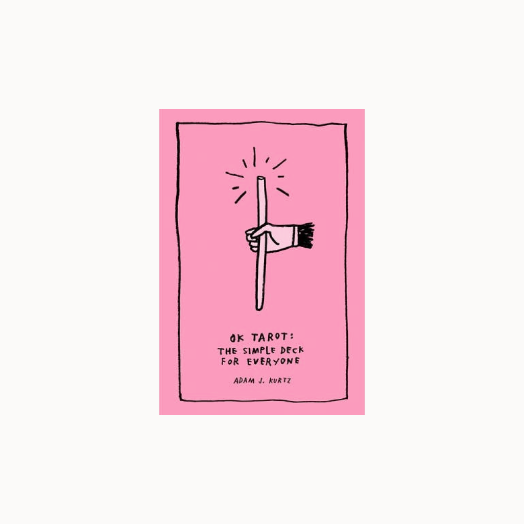 Book cover of 'OK Tarot: The Simple Deck for Everyone' by Adam J. Kurtz with a hand holding a stick on a pink background.
