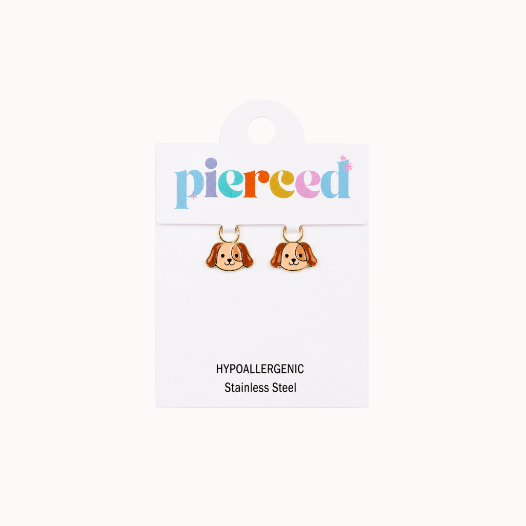 Dog-shaped earrings on a 'pierced' branded card with a white background