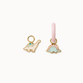 Two dinosaur-shaped charms on a white background