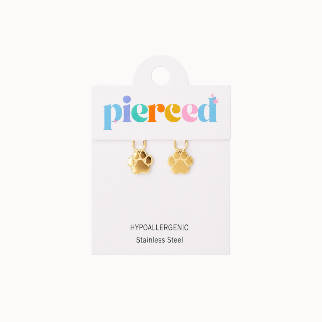 Gold paw-shaped earrings on a 'pierced' branded card with a white background
