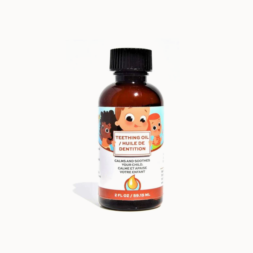 Small brown bottle of teething oil with label