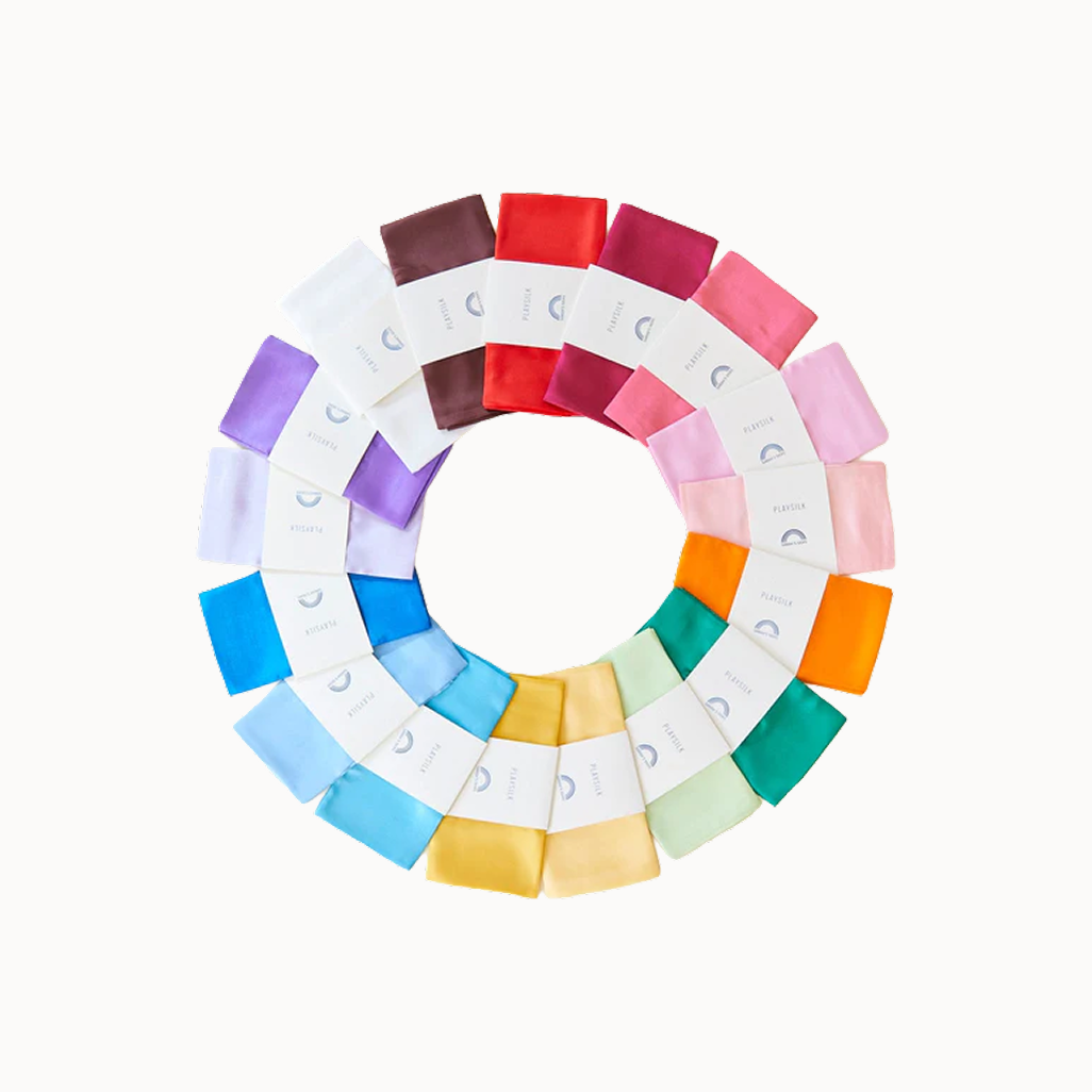 Color swatch wheel with various fabric swatches arranged in a circular pattern on a white background.