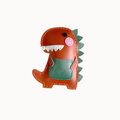 Dinosaur-shaped pouch on a fluffy white surface