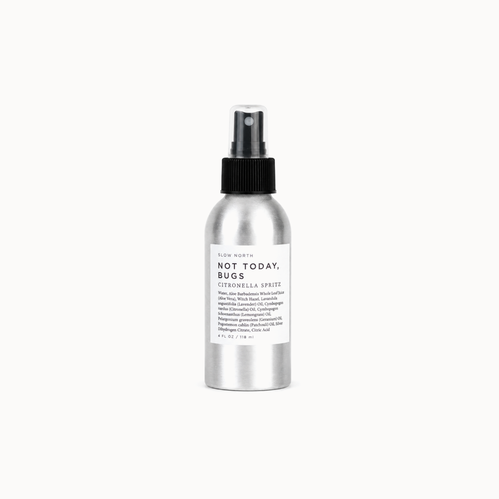Silver spray bottle labeled 'Not Today, Bugs' on a white background