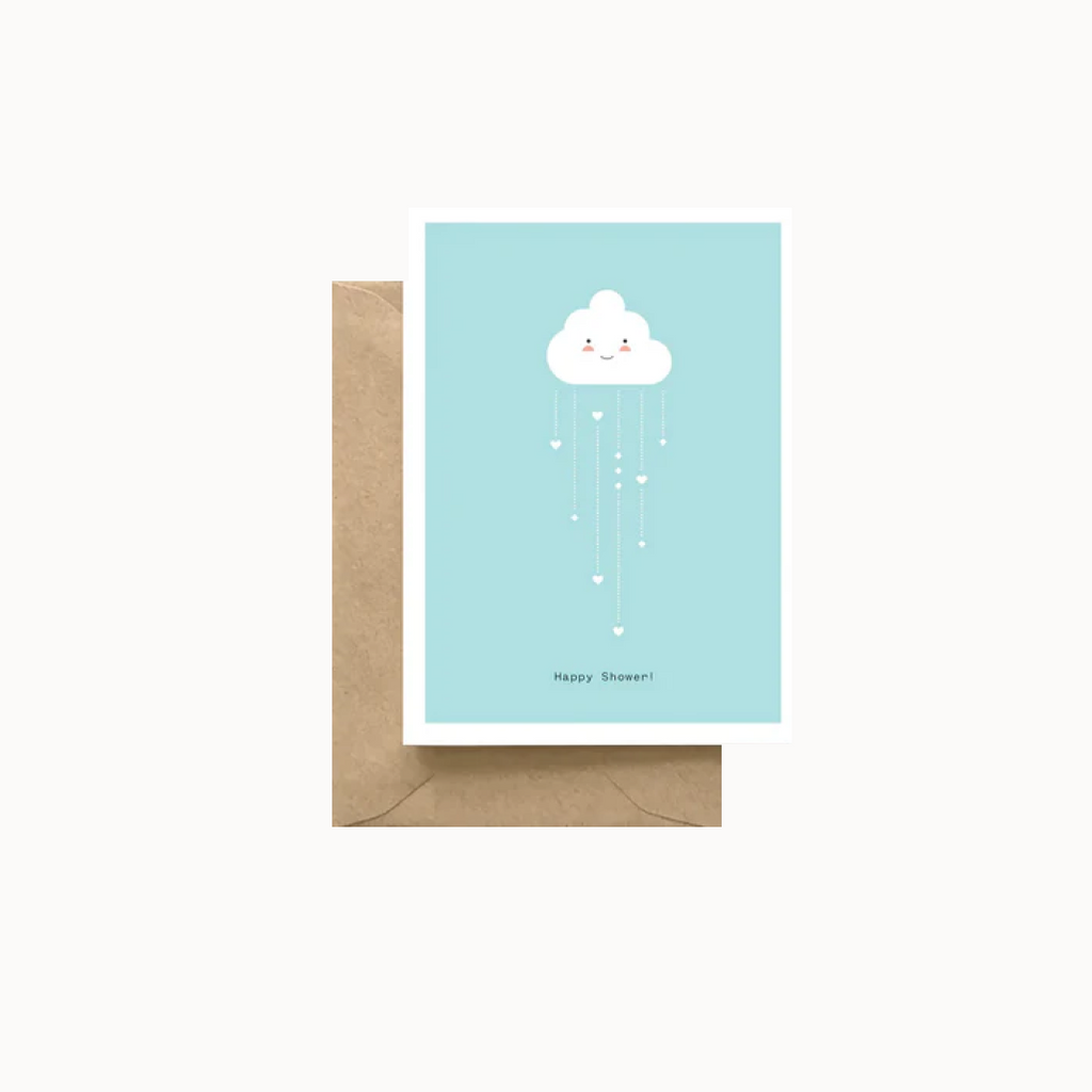 cloud raining hearts on light blue card on brown envelope