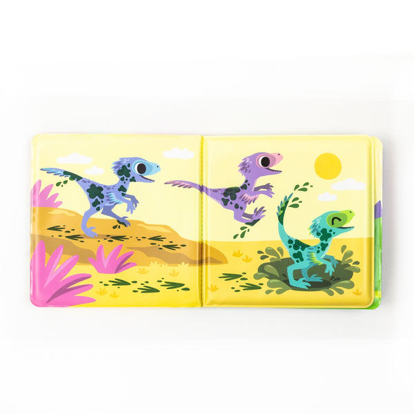 Children's book with colorful dinosaur illustrations on a yellow background