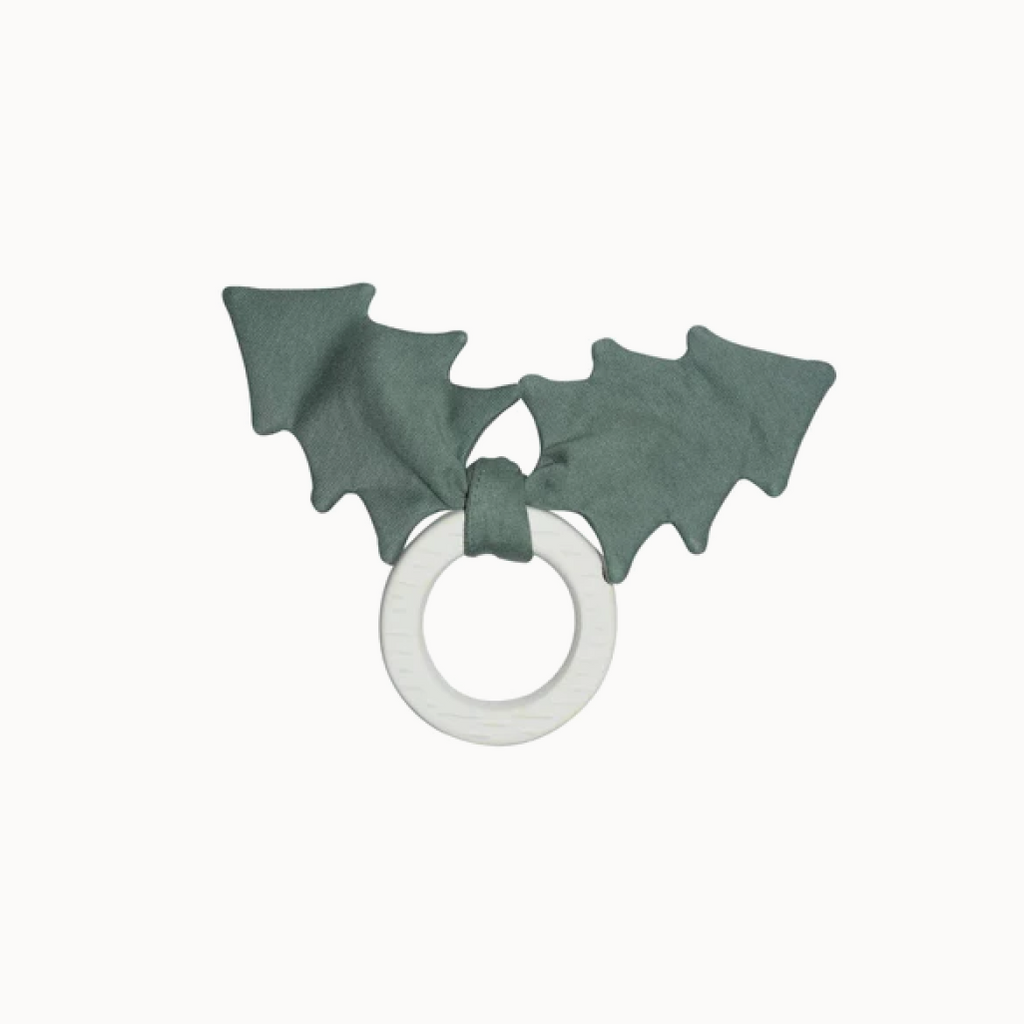 White teether with green hristmas tree-shaped loveys