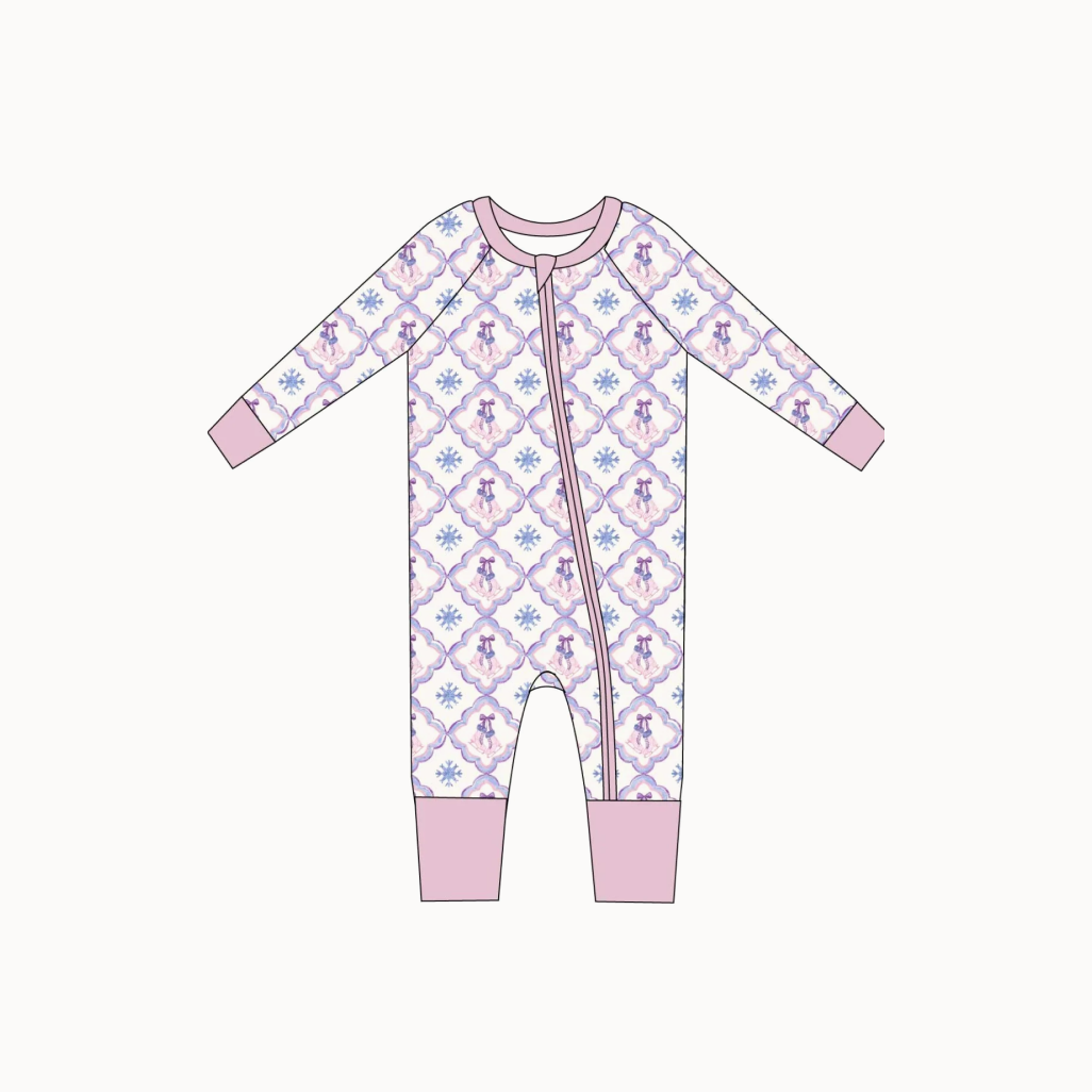 Bodysuit pajamas with illustrated ice skates, snowflakes, and bows.