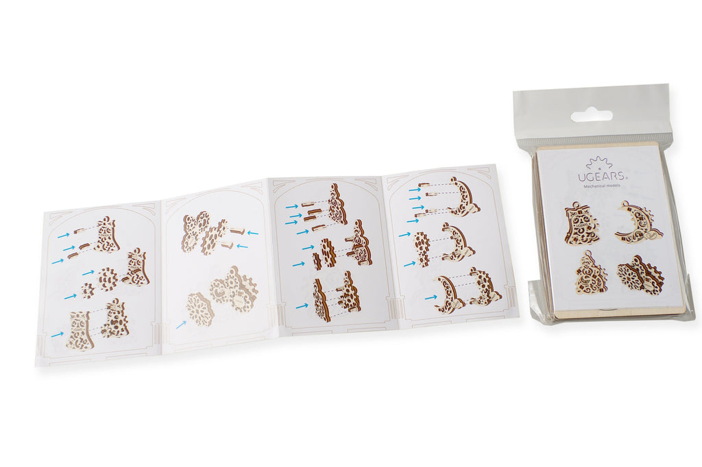 Instructions and packaging for wooden DIY puzzle ornaments