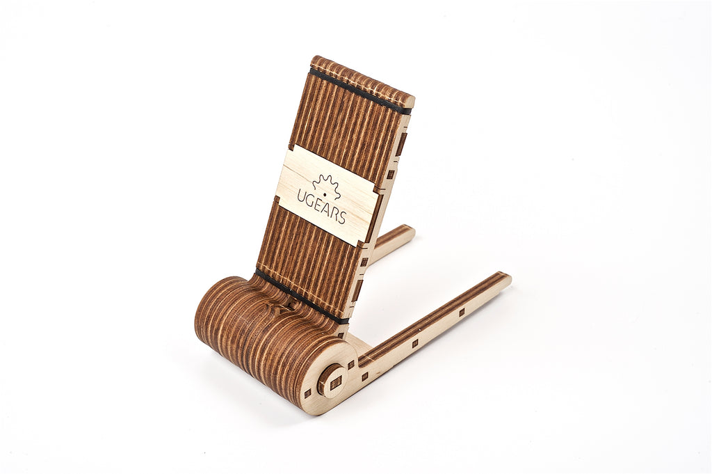 Wooden phone holder on a white background