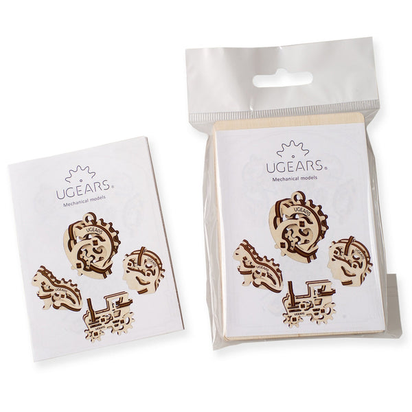 Ugears wooden Tribiks puzzle sets in packaging on white background