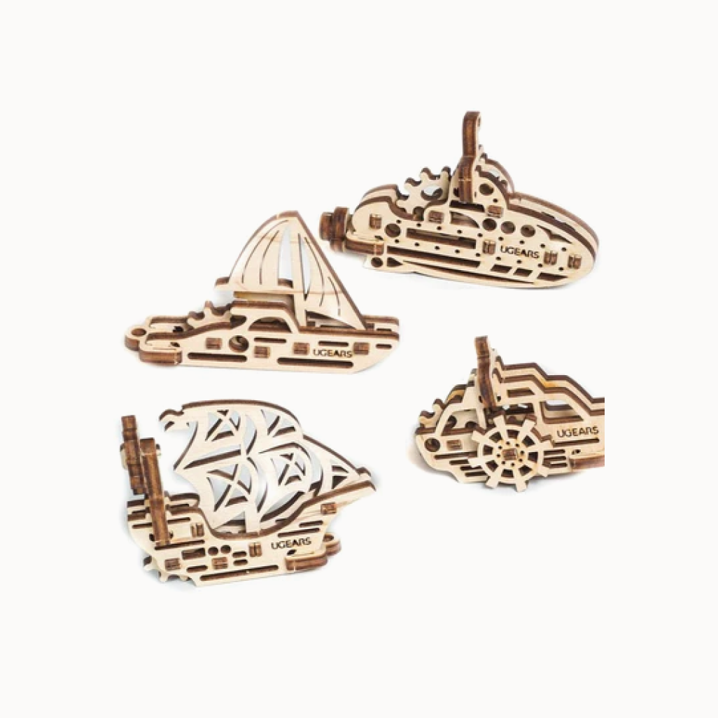 Ugears wooden ship puzzles on white background