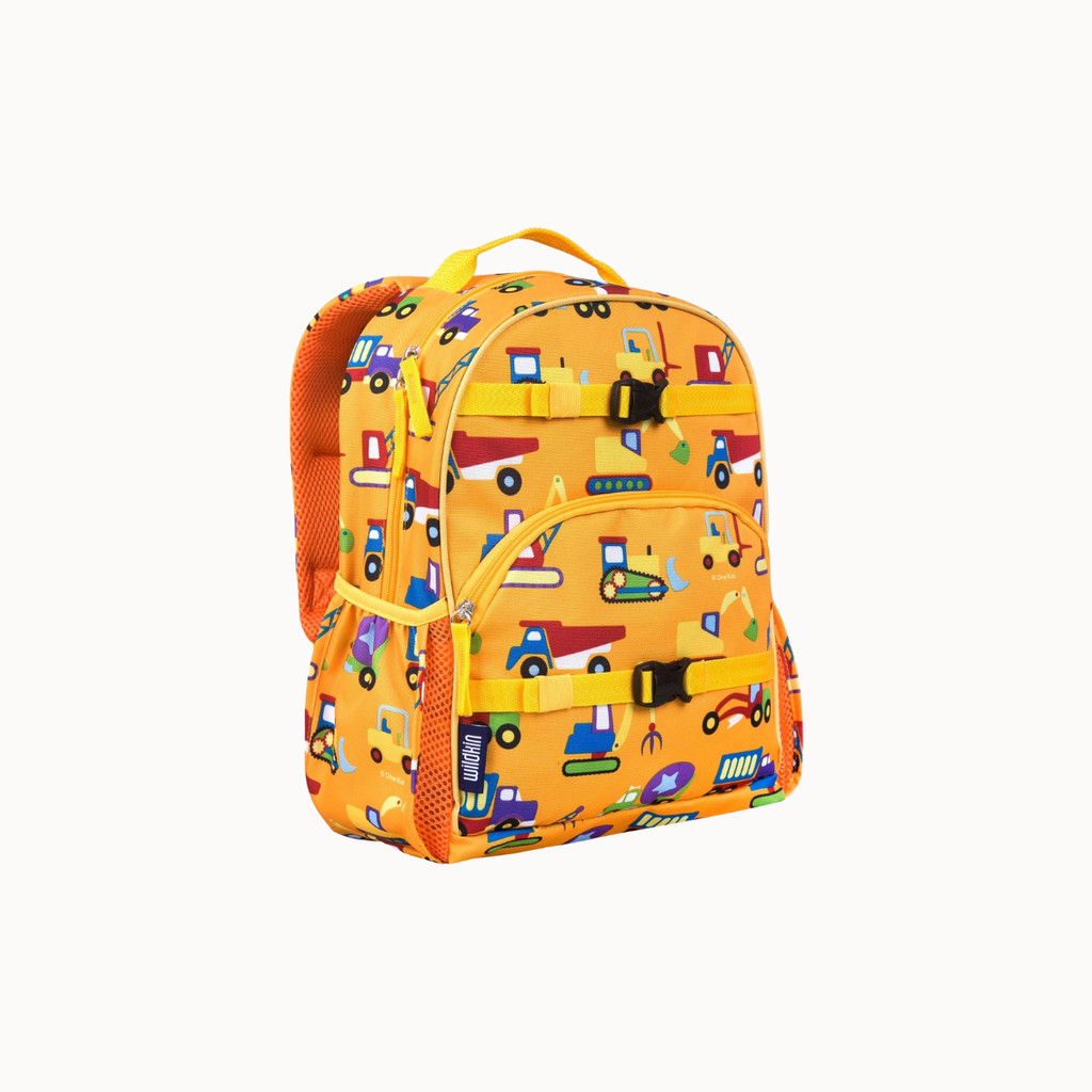 A yellow school backpack with a colorful construction vehicle pattern, featuring a front zippered pocket and side mesh pockets, shown on a light gray background.