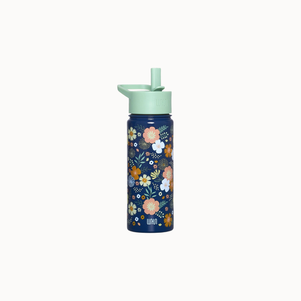 A reusable water bottle with a dark navy blue body decorated with a colorful floral pattern, featuring a mint green lid and straw on a light off-white background.