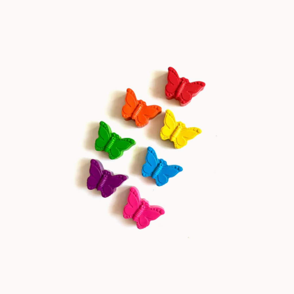 Colorful butterfly-shaped crayons on a white background