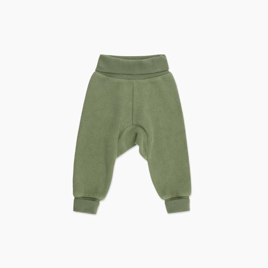 Green baby pants on a white background